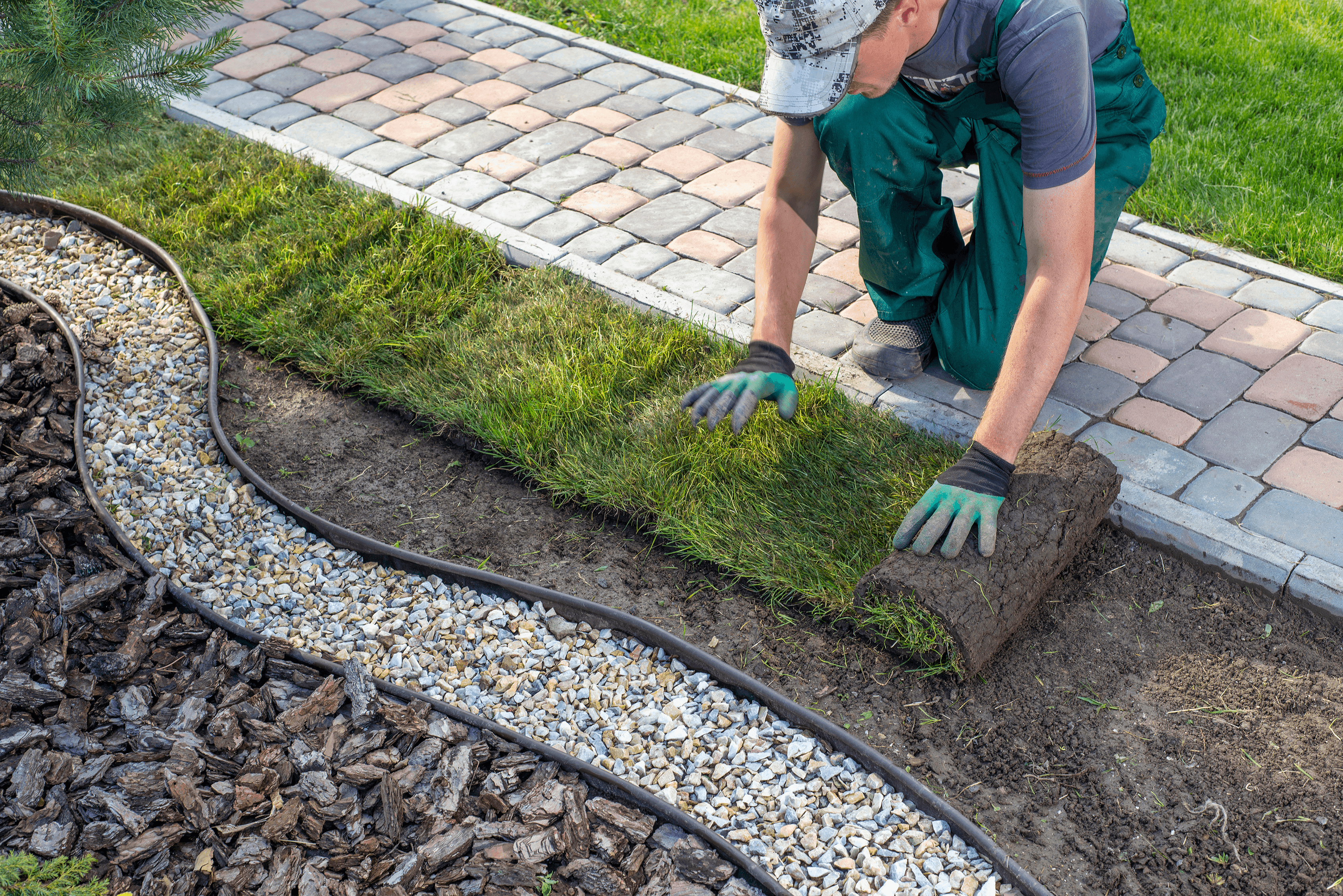 Professional lawn care service maintaining a residential property